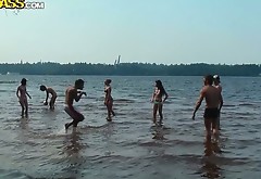 Salty Russian harwlos play volleyball at the beach in bikini